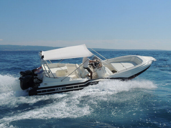 Experience the charm of the night in Hvar city with our Zar Fromenti motorboat in Bol, Croatia