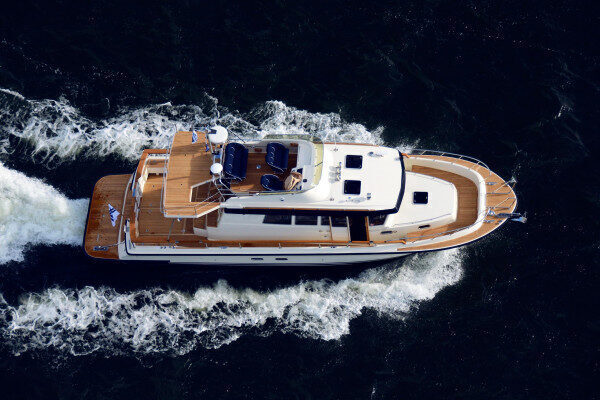 Exploring Santorini with Our Most Luxurious Motor Yacht for a Private Cruising Experience